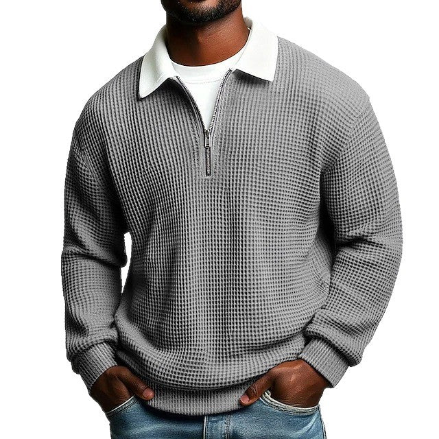 Polo homme à manches longues, col zippé, en tissu gaufré uni, idéal pour le printemps et l'automne. Parfait pour le quotidien.