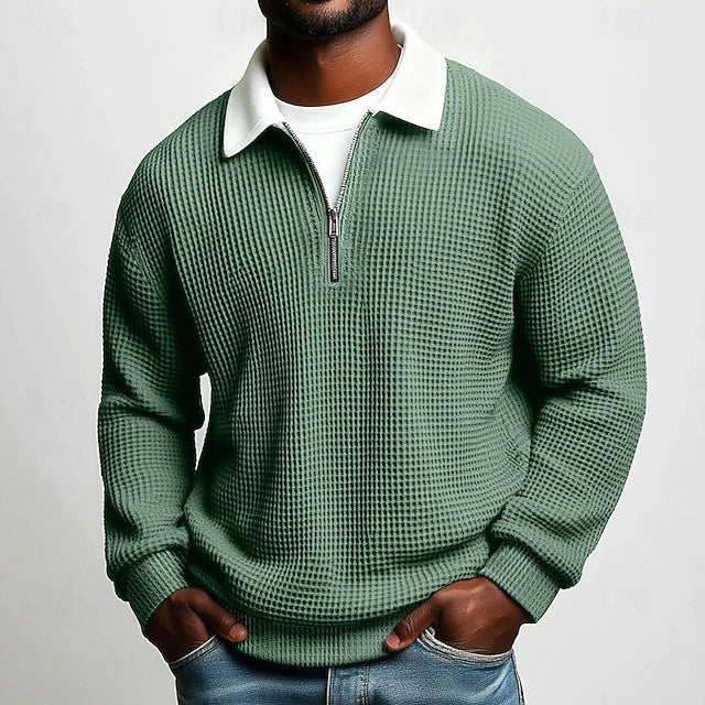 Polo homme à manches longues, col zippé, en tissu gaufré uni, idéal pour le printemps et l'automne. Parfait pour le quotidien.