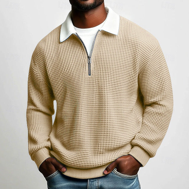 Polo homme à manches longues, col zippé, en tissu gaufré uni, idéal pour le printemps et l'automne. Parfait pour le quotidien.