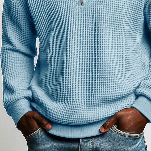 Polo homme à manches longues, col zippé, en tissu gaufré uni, idéal pour le printemps et l'automne. Parfait pour le quotidien.