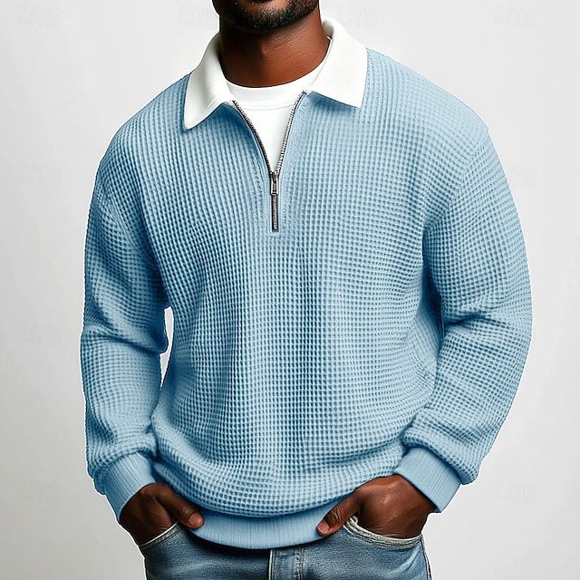 Polo homme à manches longues, col zippé, en tissu gaufré uni, idéal pour le printemps et l'automne. Parfait pour le quotidien.